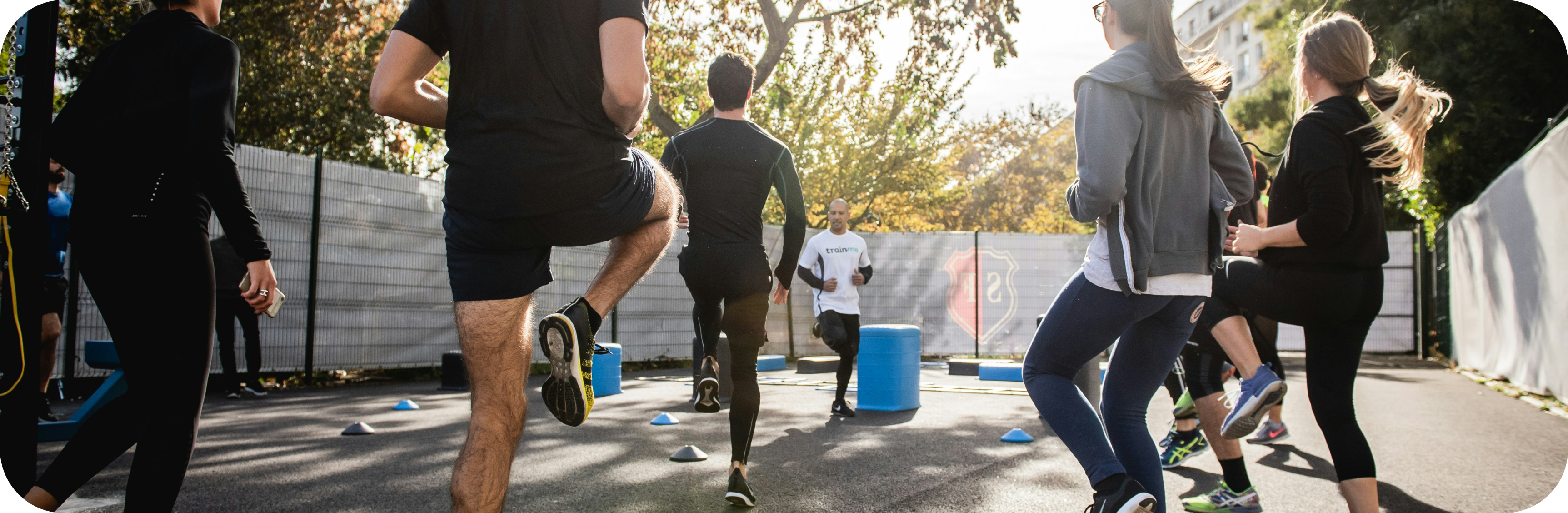 group of people exercising outside